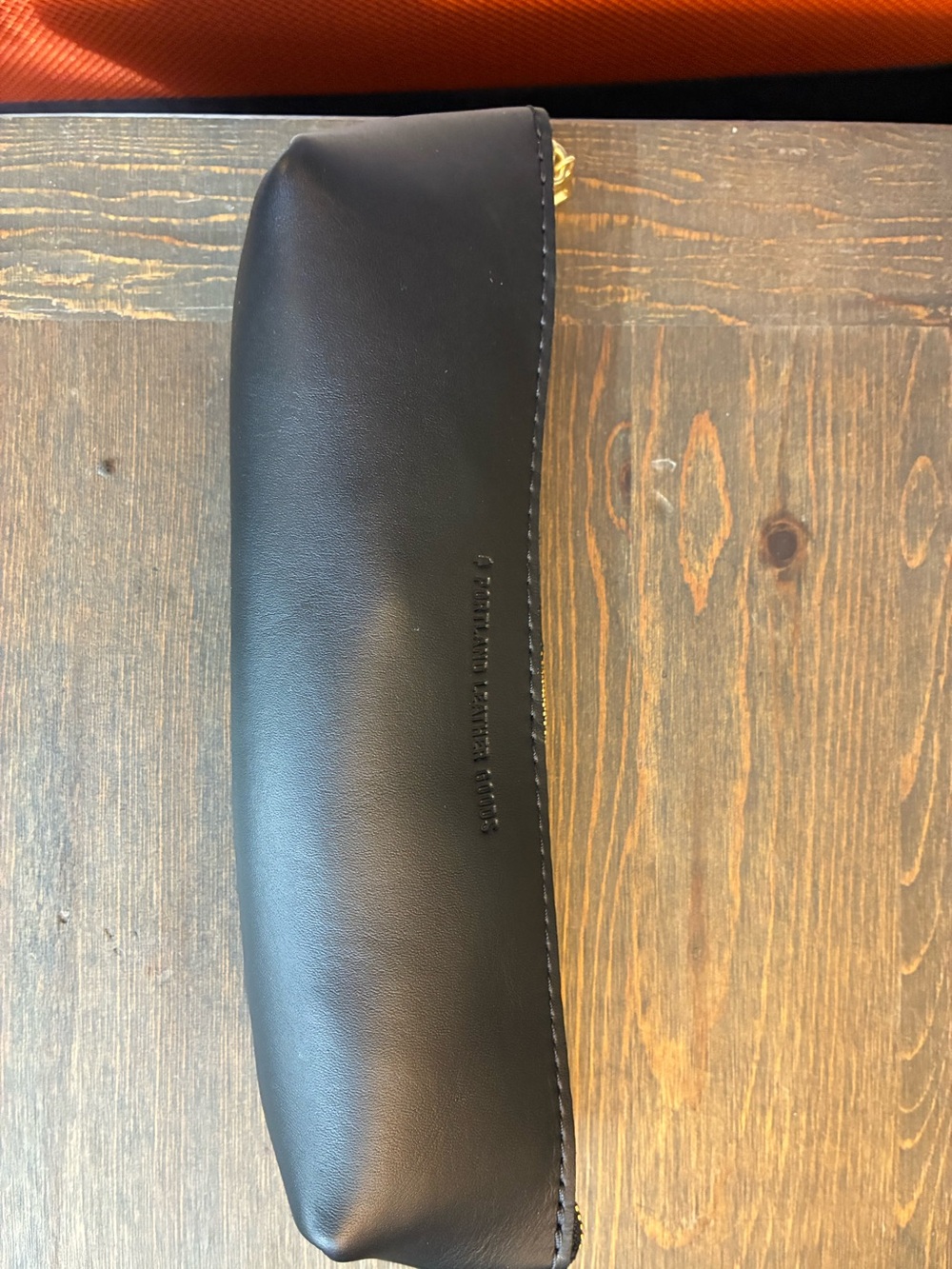 Brand new Portland leather smooth black pouch